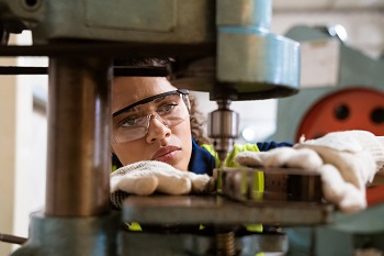 Female Worker With Safety Goggles